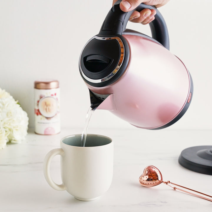 HOT WATER BOILER WITH DRIP FREE SPOUT - With a long drip-free spout, this cord-free tea kettle makes pouring hot water safely—the perfect electric water heater for hosting. Automatically shuts off for safety and boil-dry protection.
