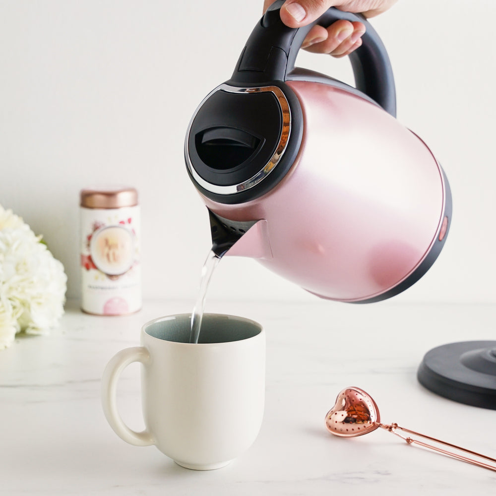 HOT WATER BOILER WITH DRIP FREE SPOUT - With a long drip-free spout, this cord-free tea kettle makes pouring hot water safely—the perfect electric water heater for hosting. Automatically shuts off for safety and boil-dry protection. 