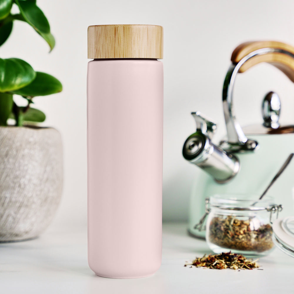 BEAUTIFUL CERAMIC MUG WITH TEA INFUSER - The slim, sleek design of the Tatyana travel tea cup with infuser and lid makes it comfortable to hold and keeps your favorite tea piping hot. The stainless steel infuser cup is easy to use and easy to clean.
