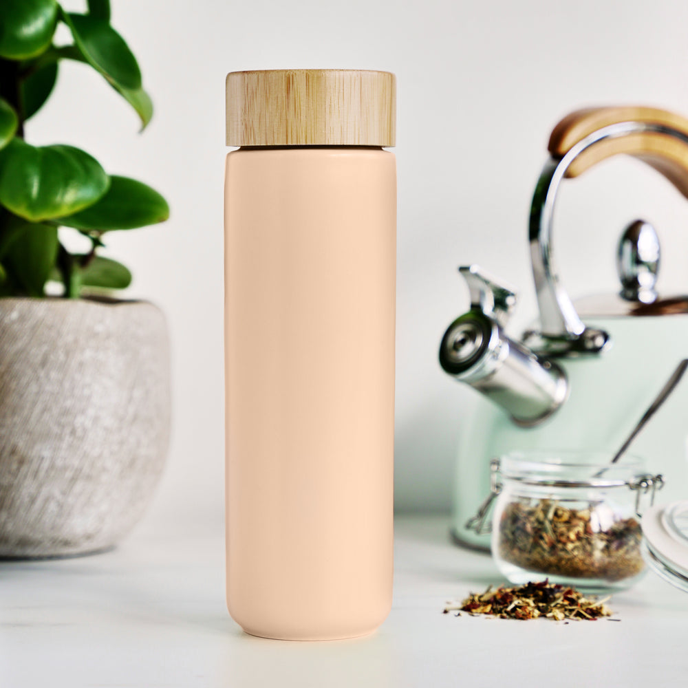 BEAUTIFUL CERAMIC MUG WITH TEA INFUSER - The slim, sleek design of the Tatyana travel tea cup with infuser and lid makes it comfortable to hold and keeps your favorite tea piping hot. The stainless steel infuser cup is easy to use and easy to clean.