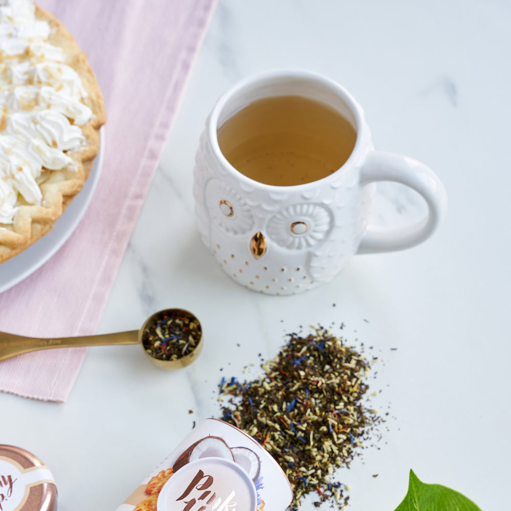 WHITE CERAMIC WITH GOLD DETAILS - White ceramic and metallic gold create a beautiful contrast that highlights the owl design. A gold message on the inside of this charming mug reads “life’s a hoot” for a playful surprise at the bottom of your cup.
