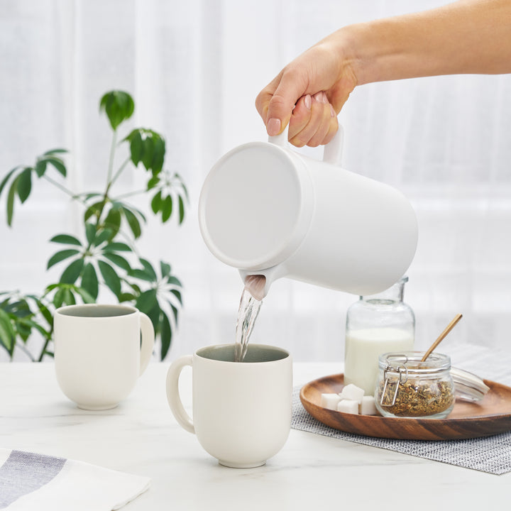 STUNNING STONEWARE TEAPOT - Function meets style in this loose leaf tea brewer. With a modern design, stoneware pot, stylish matte finish, lid with a lip, and gold infuser basket, this teapot adds some flair to your morning tea routine.
