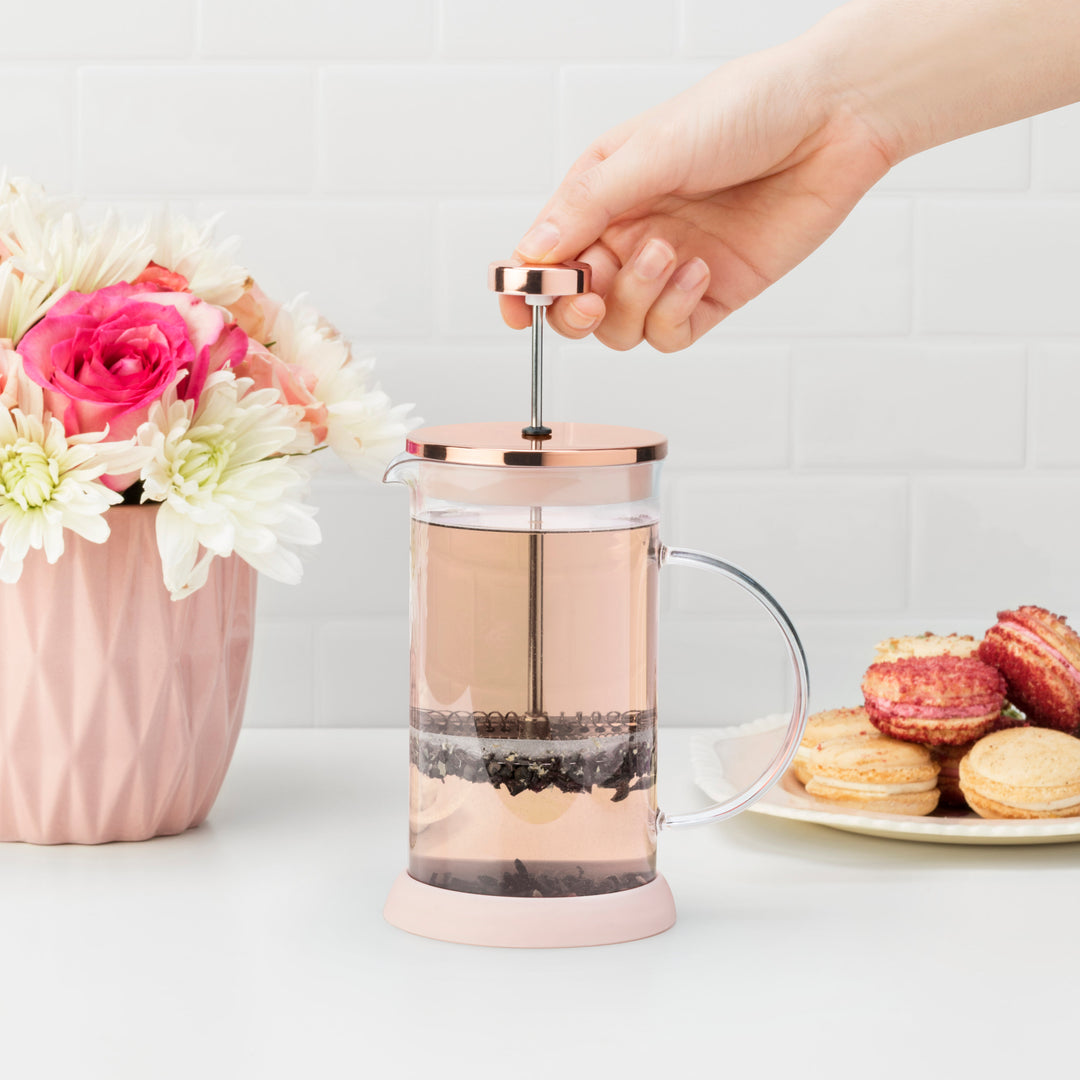 STUNNING PINK TEA PRESS - Function meets style in this tea and coffee press. Borosilicate glass keeps your beverage hot and protects from thermal shock, while sturdy stainless steel and pink accents add some flair to your morning routine.