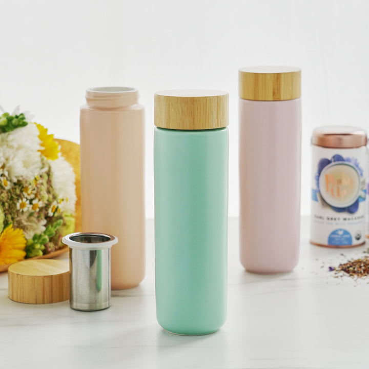 STAINLESS STEEL TEA INFUSER TUMBLER - Choose your tea, infuse, and easily clean up after with a removable tea basket that fits right into the top of the double-walled ceramic tea mug with infuser and lid made of bamboo with a silicone gasket.